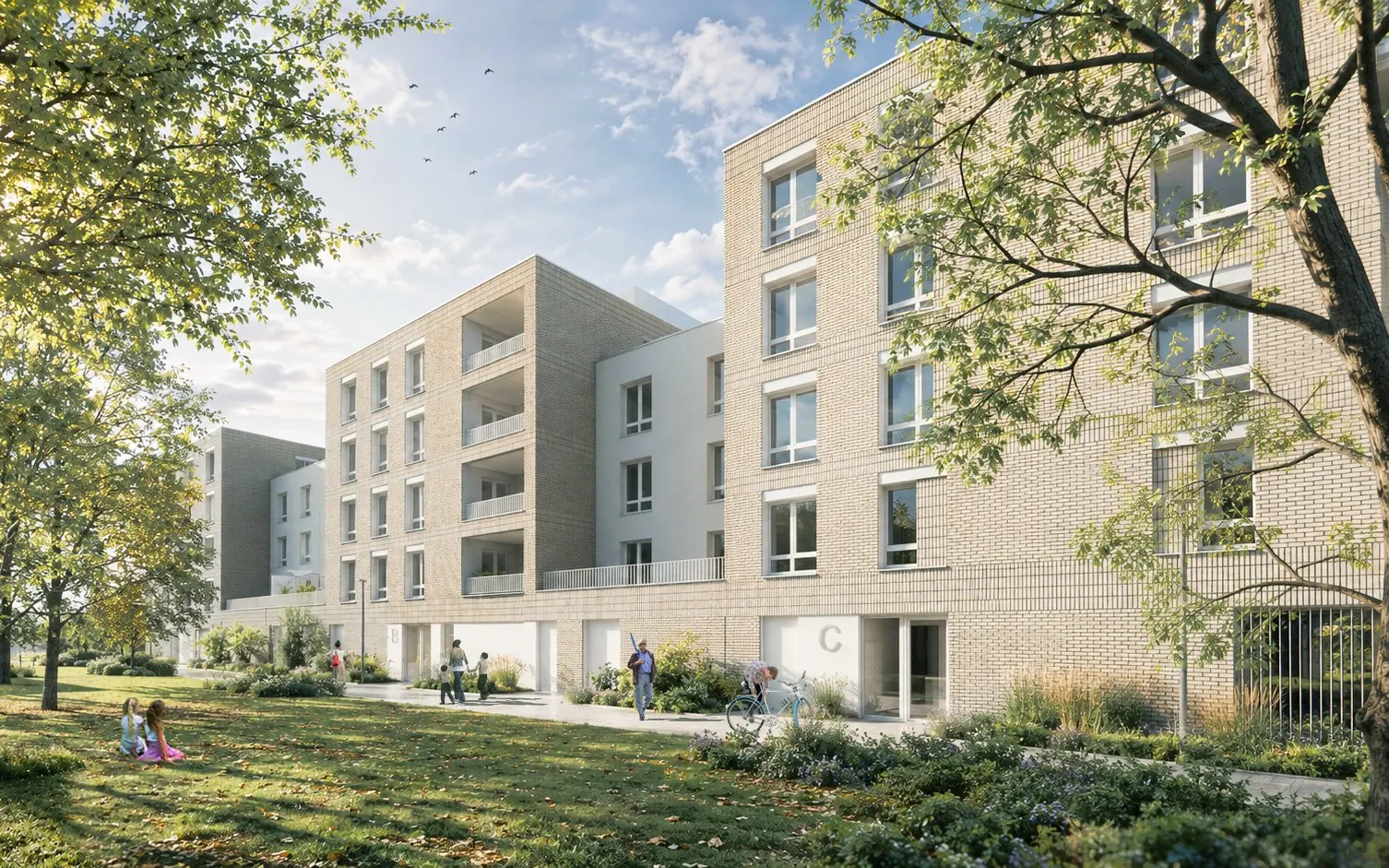 Façade en brique claire de la résidence Épure côté parc