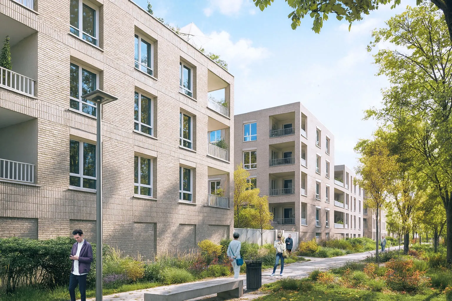 Façades en brique claire le long du cheminement paysager